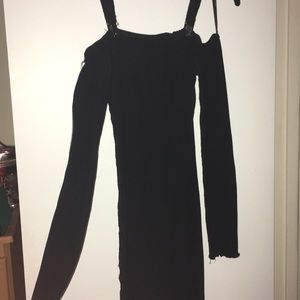 Skin tight off the shoulder black dress